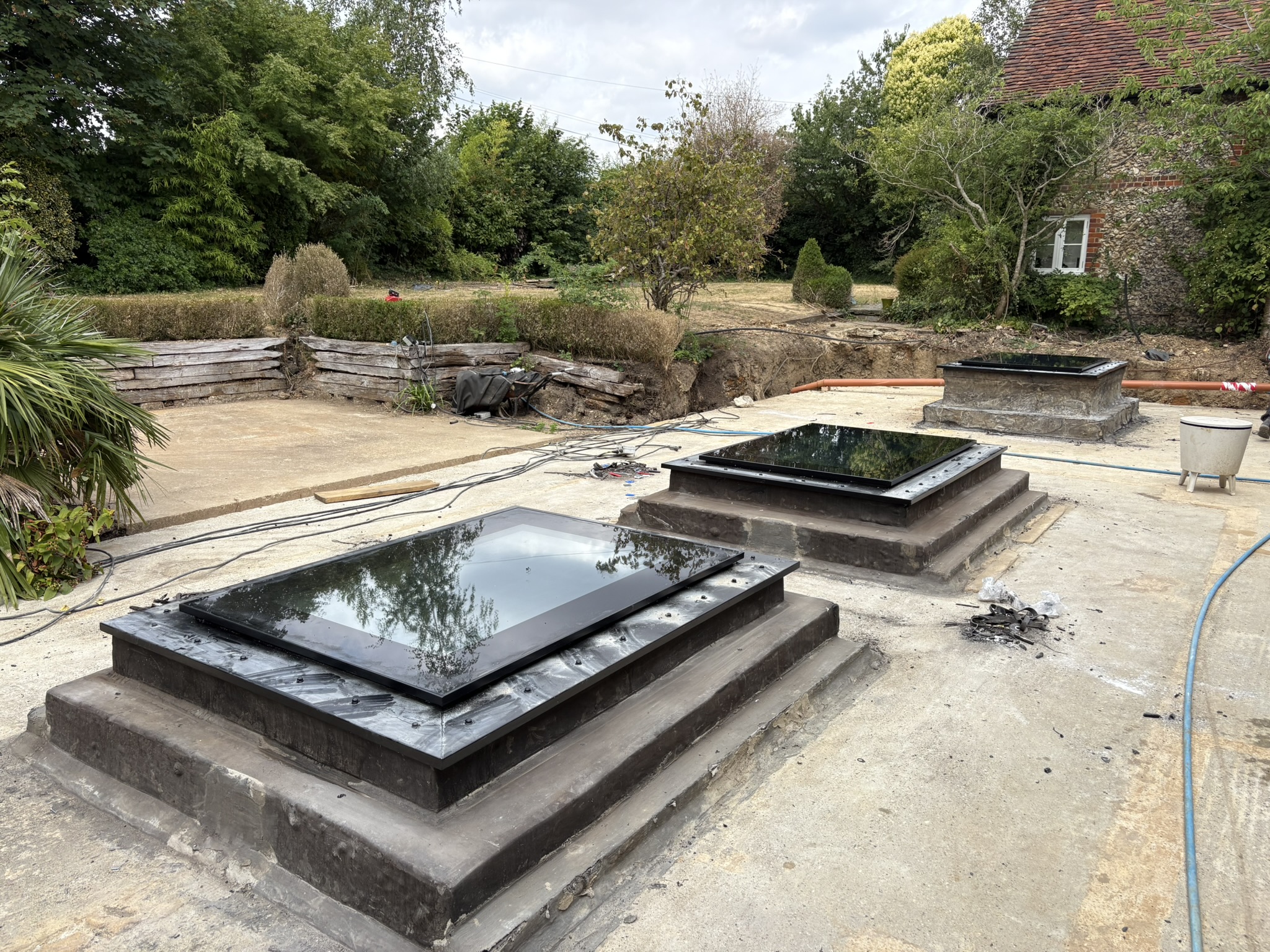 Three bespoke walk-on skylights installed in garden, Harpenden