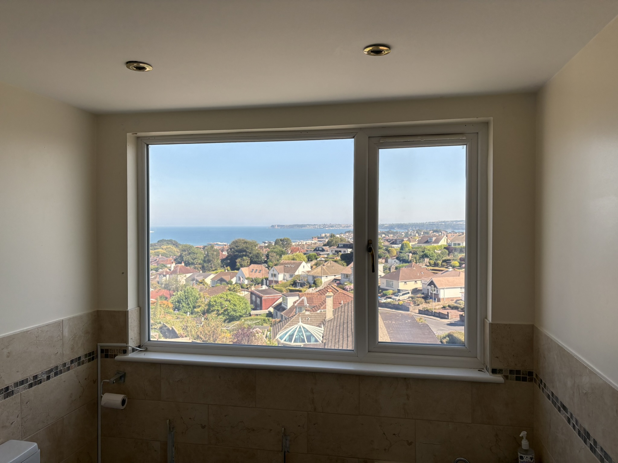 Switchable privacy glass — clear, views over Torbay