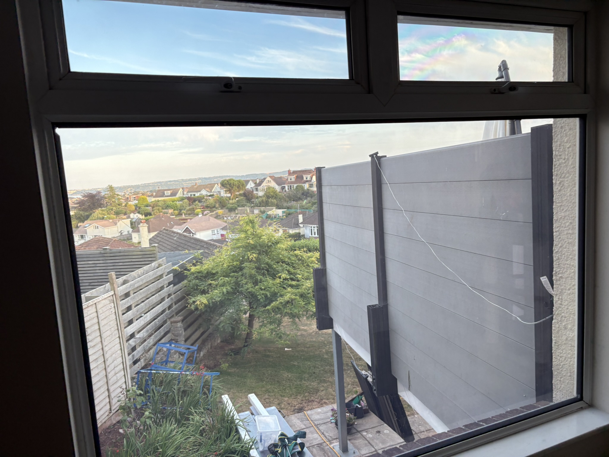Completed switchable glass installation — residential property overlooking Torbay