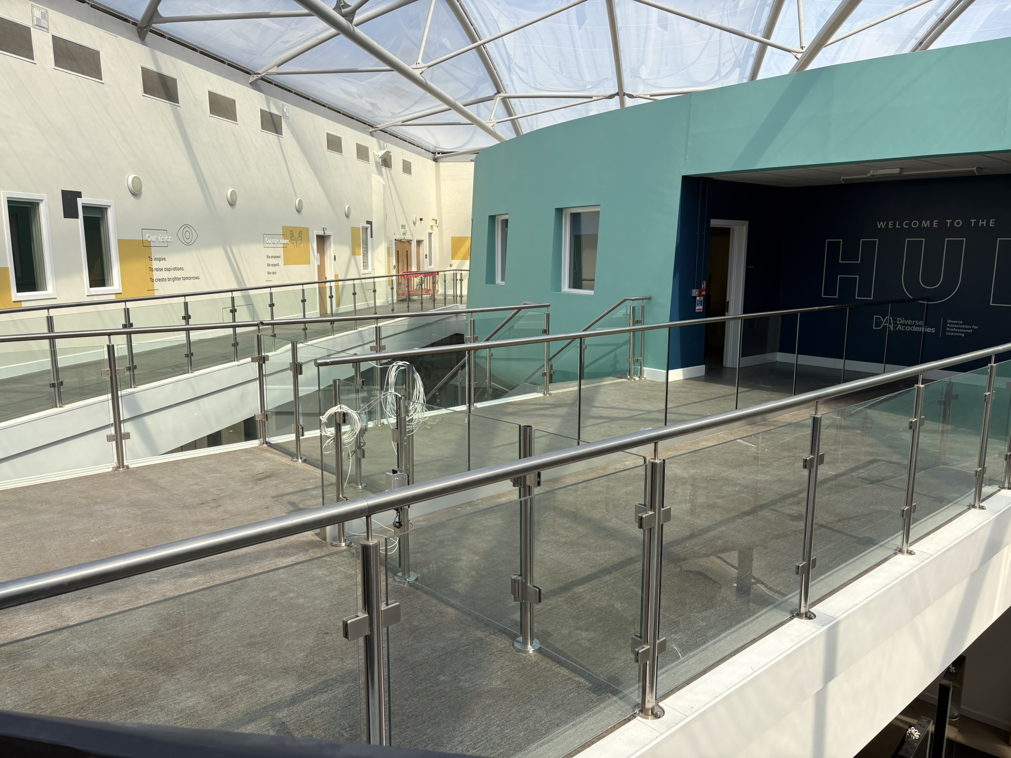 Stainless steel and glass balustrade across the school mezzanine